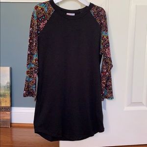 three quarter sleeve LuLaRoe shirt.